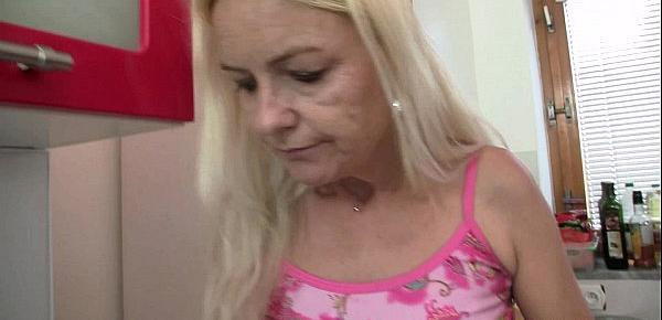  He fucks blond motherinlaw at the kitchen